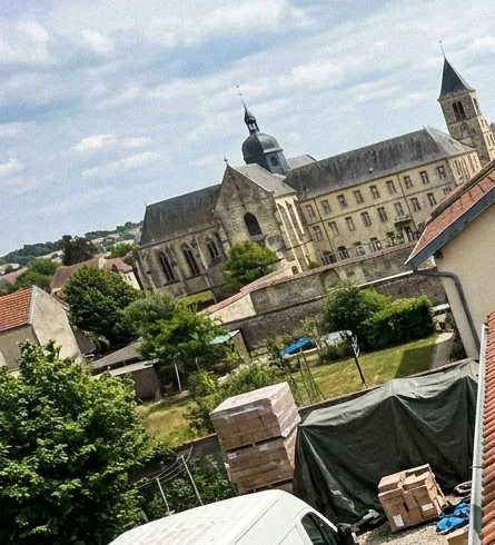 Vue depuis un chantier de toiture à Pont-à-Mousson sur l'abbaye des Prémontrés